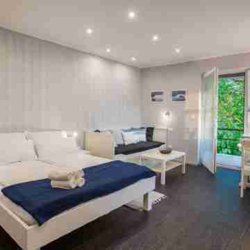 Apartmaji Koman Rooms