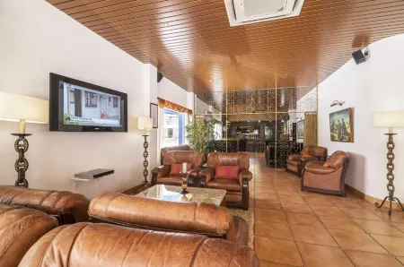 Rosamar Apartamentos Отели в г. Алкантарилья