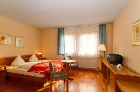 Hotel Tilman Отели в г. Бад-Нойштадт-ан-дер-Зале