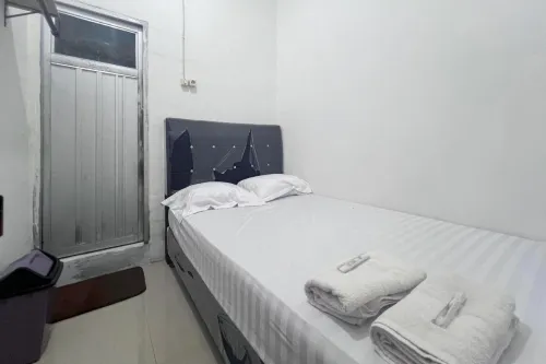 Penginapan Dheas Mitra RedDoorz