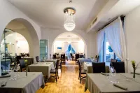 特拉扎瑪可尼斯巴瑪尼酒店 - 早餐