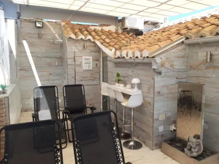 Apartamentos Marques de La Merced Отели рядом с достопримечательностью «Estación de Autobuses de Málaga»