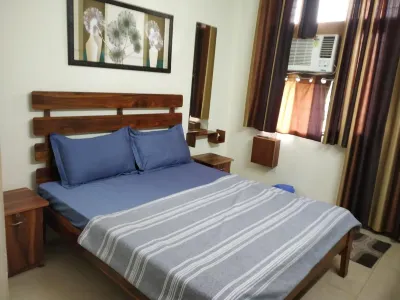 The Raveesh E24 - 2BHK Serviced Apartment