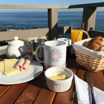 Bahía Luz Hostal Отели в г. Конкон