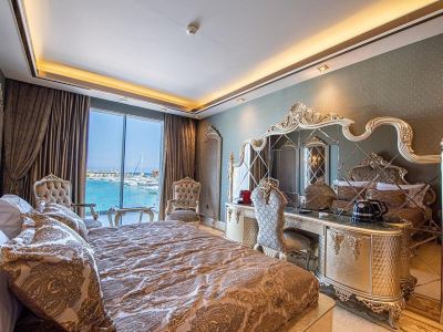 Deluxe Room Les Ambassadeurs Hotel & Casino Photo