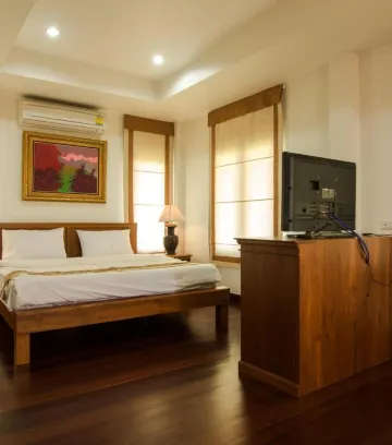 ห้องดีลักซ์ เตียงใหญ่ พร้อมระเบียง