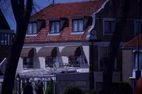 Hotel Sanders de Paauw Отели в г. 