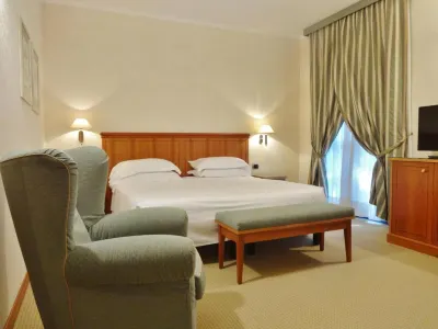Albergo Excelsior Magenta Hotel in zona Il Destriero • Centro Commerciale