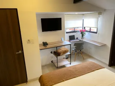 Rivière Boutique Hotel Hoteles cerca de Centro de Convenciones Plaza Mayor