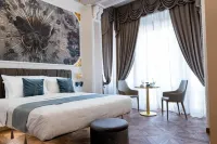 Queen Cattleya Suite Hotel di Genoa