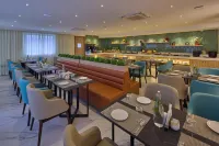 Grand Continent Hebbal A Sarovar Portico Affiliate Hotel - Parkplatz