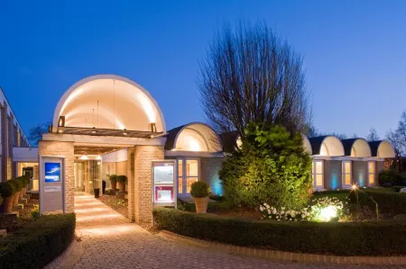 Novotel Valenciennes Отели в г. Рувиньи