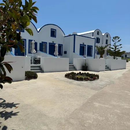 Hotel Paradisos Oia Отели рядом с достопримечательностью «Пляж мыса Колумбо»