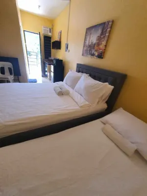 Lucena Meg's Studio Apmnt Deluxe Rm-Near SM-Wifi فنادق في لوسينا