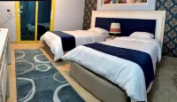 La Boutique Residence Hotels near Caves Shopping Center