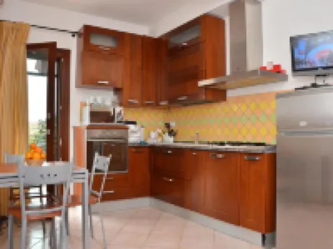 อิลเนสโปโล ฟิออริโต โรงแรมในOrosei