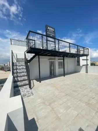 Airo Suites Makati Отели рядом с достопримечательностью «The Linear Makati Tower 2»