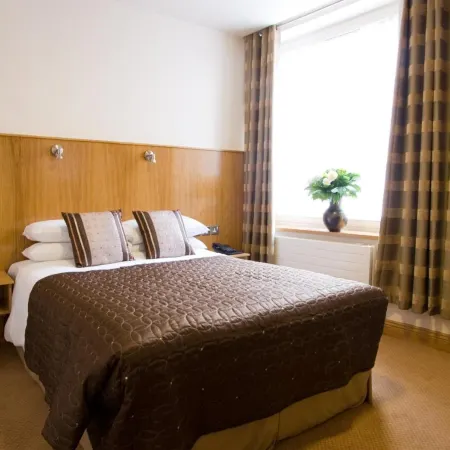 Blooms Hotel Отели рядом с достопримечательностью «Колледж Тринити-колледж»