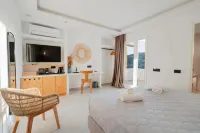أوليفينج ميكونوس لاكشري سويتس