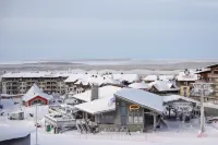 Ski-Inn RukaSuites Hotels near Magical Pond Igloos