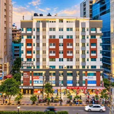SEL Nibash Hotel & Serviced Apartments Hoteles cerca de Universidad de Daca