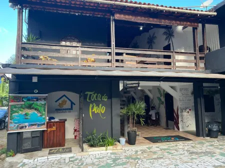 Toca do Pato Pousada Отели в г. Trindade