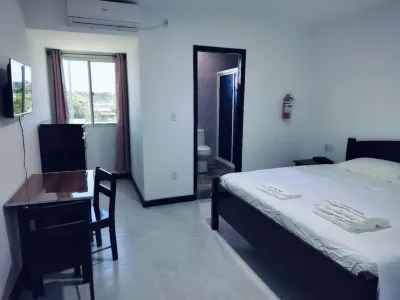 Day & Night Hotel Belmopan Отели в г. Teakettle