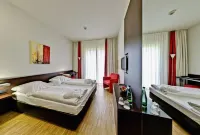Santé Royale Hotel- & Gesundheitsresort Bad Brambach فنادق في Erlbach