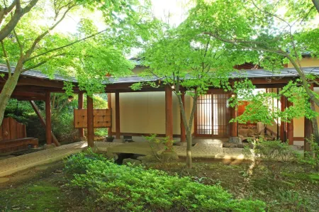 Chikurakutei Отели рядом с достопримечательностью «Aso Farm Land»