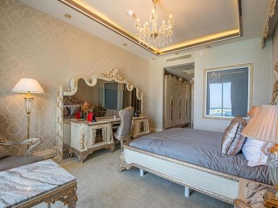 Deluxe Room Les Ambassadeurs Hotel & Casino Photo