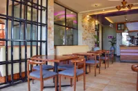 Tenda Suites and Restaurant Hôtels à : Busiro