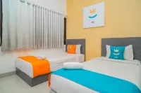 Sans Hotel Widarasari Cirebon Hotel dekat Carvil Store - Sindang Laut Cirebon
