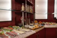 Stadt-Gut-Hotel Rheinischer Hof - servizio colazione