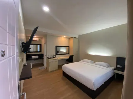 Wisma Lovebird Отели в г. Вонособо