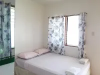 Islanders Paradise Beach فنادق في Larena