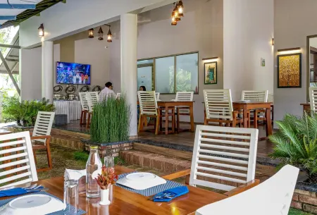 Coffee Greens Resort Отели в г. Канииамбетта