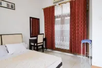 Rumah Pahoman Syariah Mitra RedDoorz Các khách sạn ở Pahoman