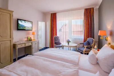 Hotel Krone Отели в г. Альценау