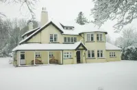 Rivendell Hotel dekat Noblehill Cafe