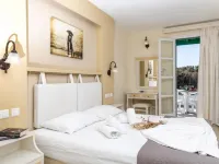 Villa Harmony Hotel berhampiran Pantai Plaka