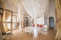 Msambweni Beach House and Private Villas - bar