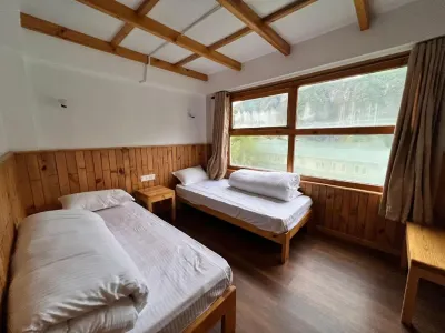 Hotel Camp de Base Hôtels à : 