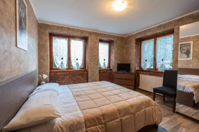 San Luigi Rooms & Apartments Hotel in zona Agenzia Funebre Paggi - Onoranze Pompe Funebri- Chiavenna
