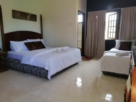 AsiaCamp Taman Negara Resort Отели в г. Джерантут