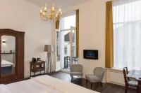 Boutique Hotel de Blauwe Pauw Hotels in Гертоґенбос