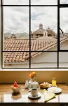 Hostal & Apartments El Triunfo - Homestays