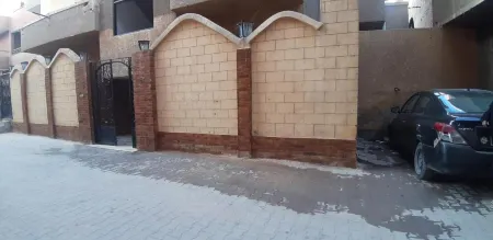 Bella Casa Pyramids Inn Отели рядом с достопримечательностью «Панорамный вид пирамид»