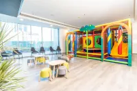 S Plaza Suites Hotel - gimnasio