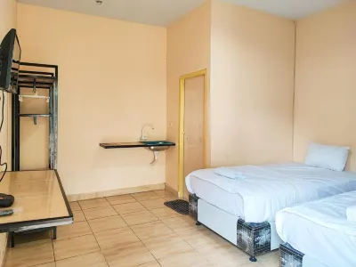 RedDoorz Syariah near Terminal Alam Barajo Jambi Hotel dekat Martabak Royal Bukit Tinggi