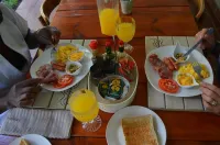Bauhenia Guesthouse - servizio colazione